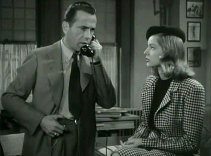 Filmruta från Utpressning med Humprey Bogart och Lauren Bacall